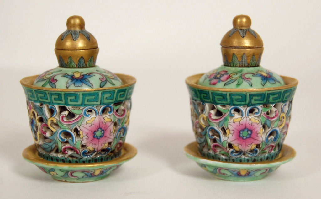 PAIR OF FAMILLE ROSE ROTATING AND RETICULATED SNUFF BOTTLES