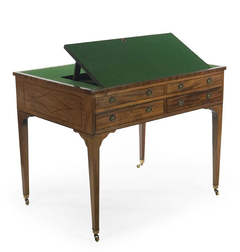 An early 19th century mahogany and ebony strung writing desk
