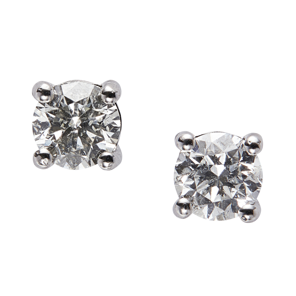 A pair of diamond stud earrings