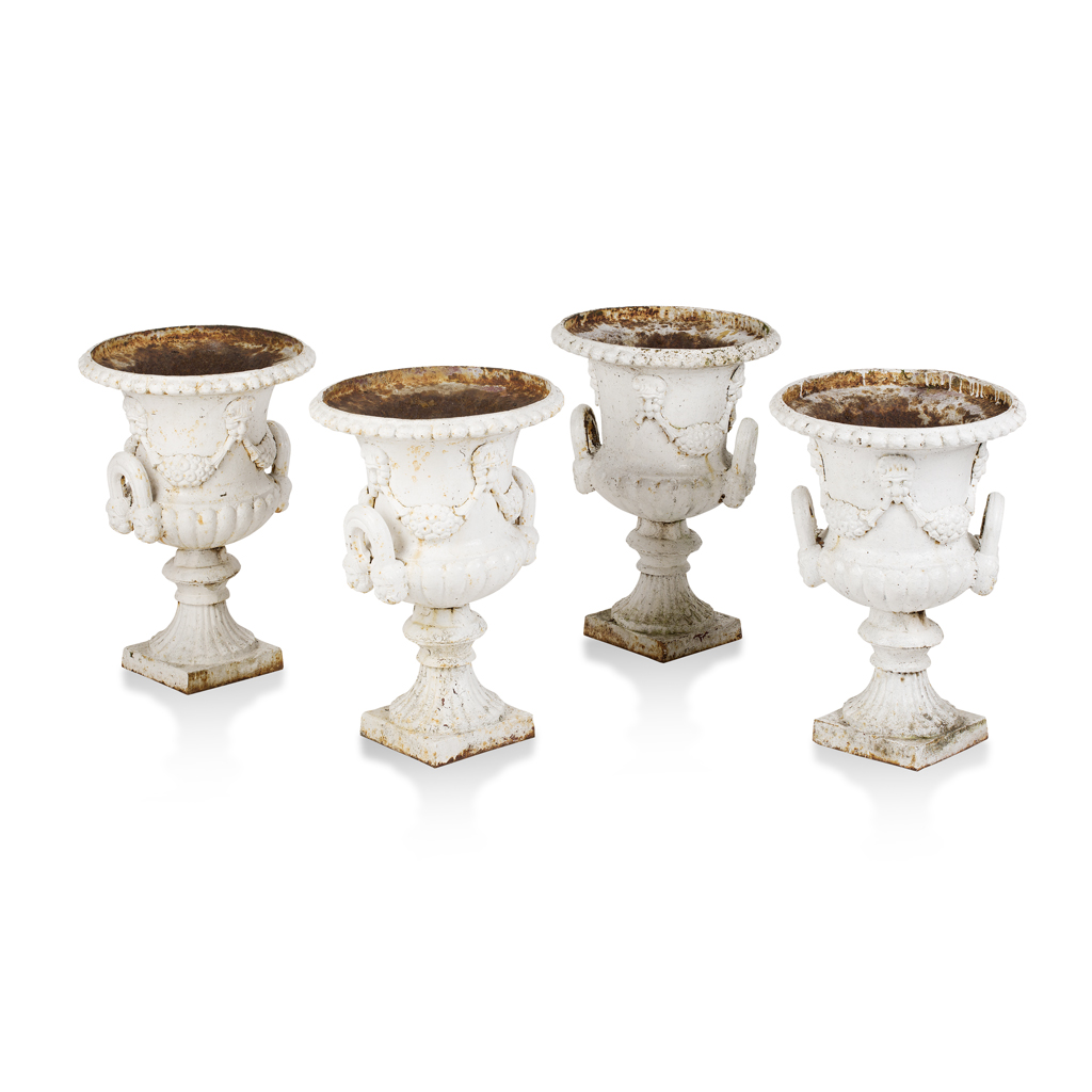 SET OF FOUR WHITE PAINTED CAST IRON URNS
