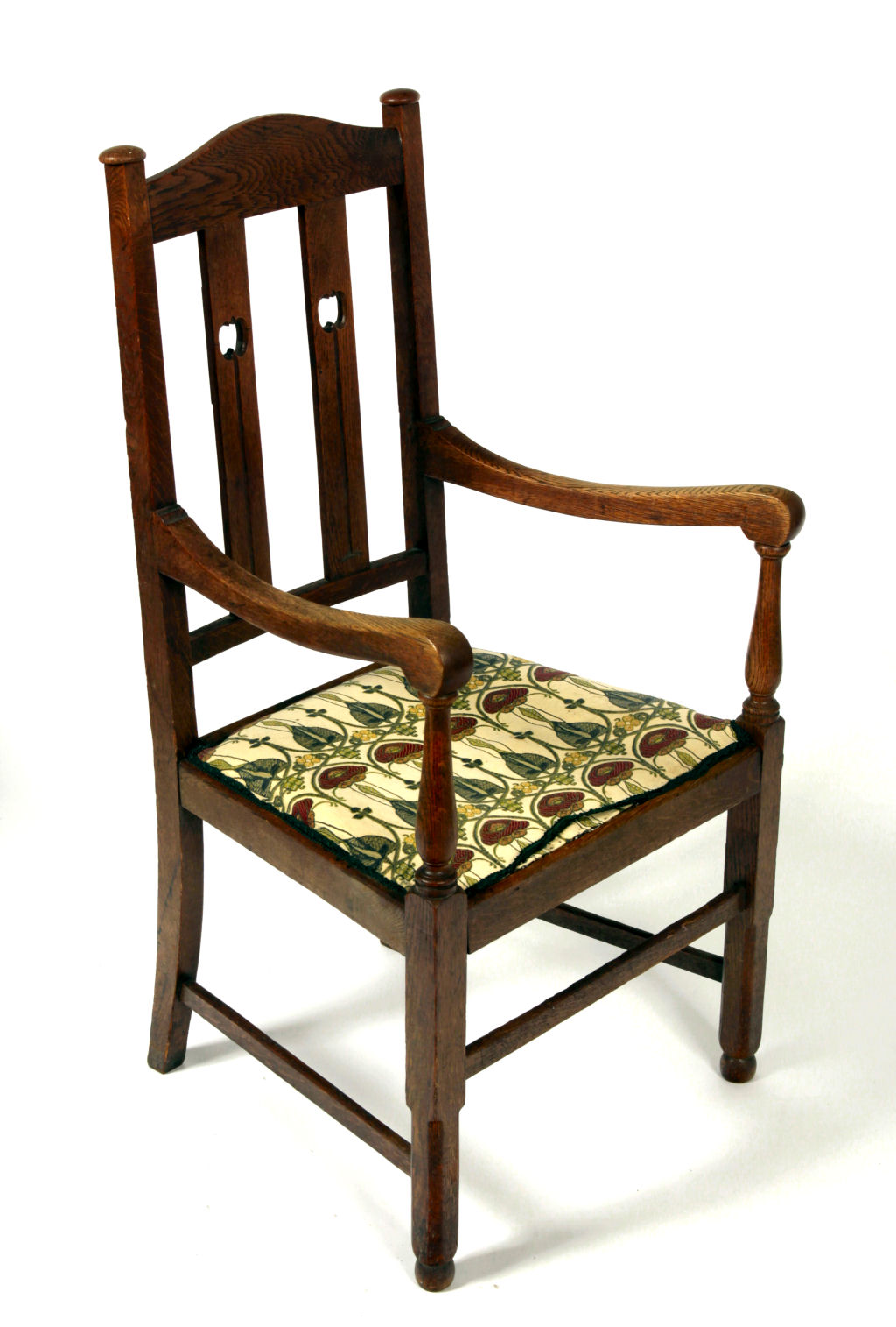 An Arts and Crafts oak high back chair