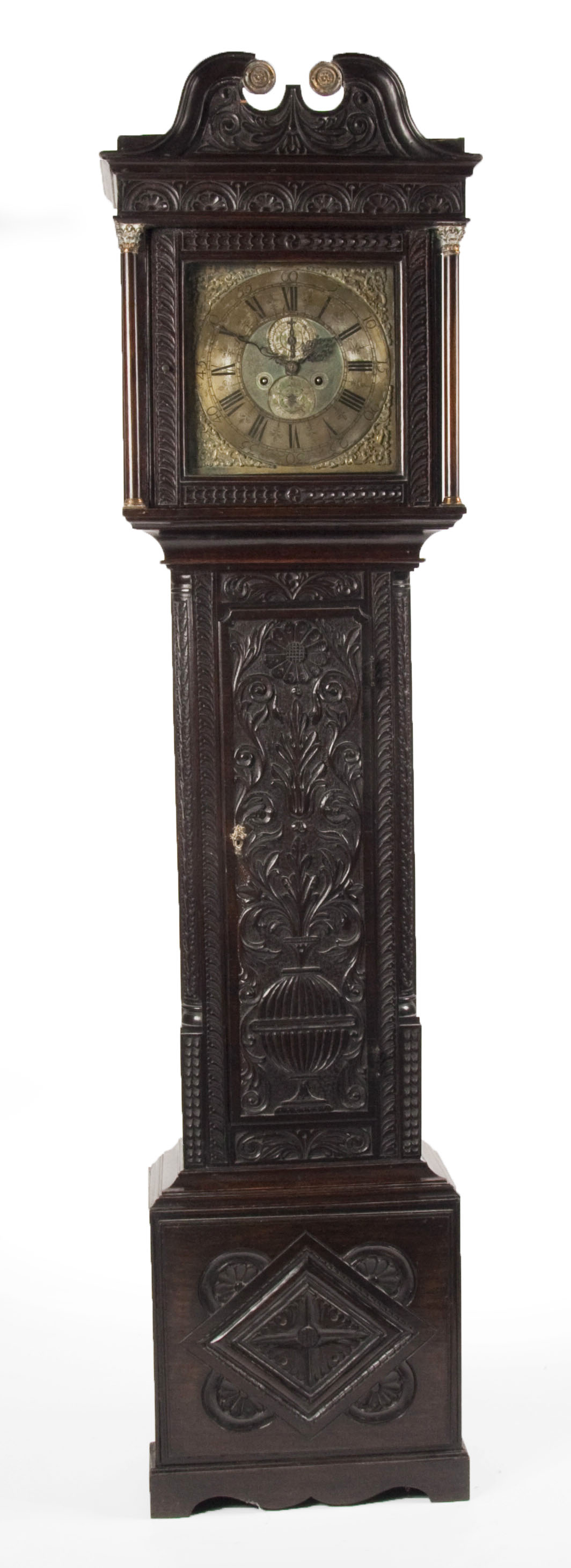 A 19th century carved stained oak longcase clock By John Sanderson