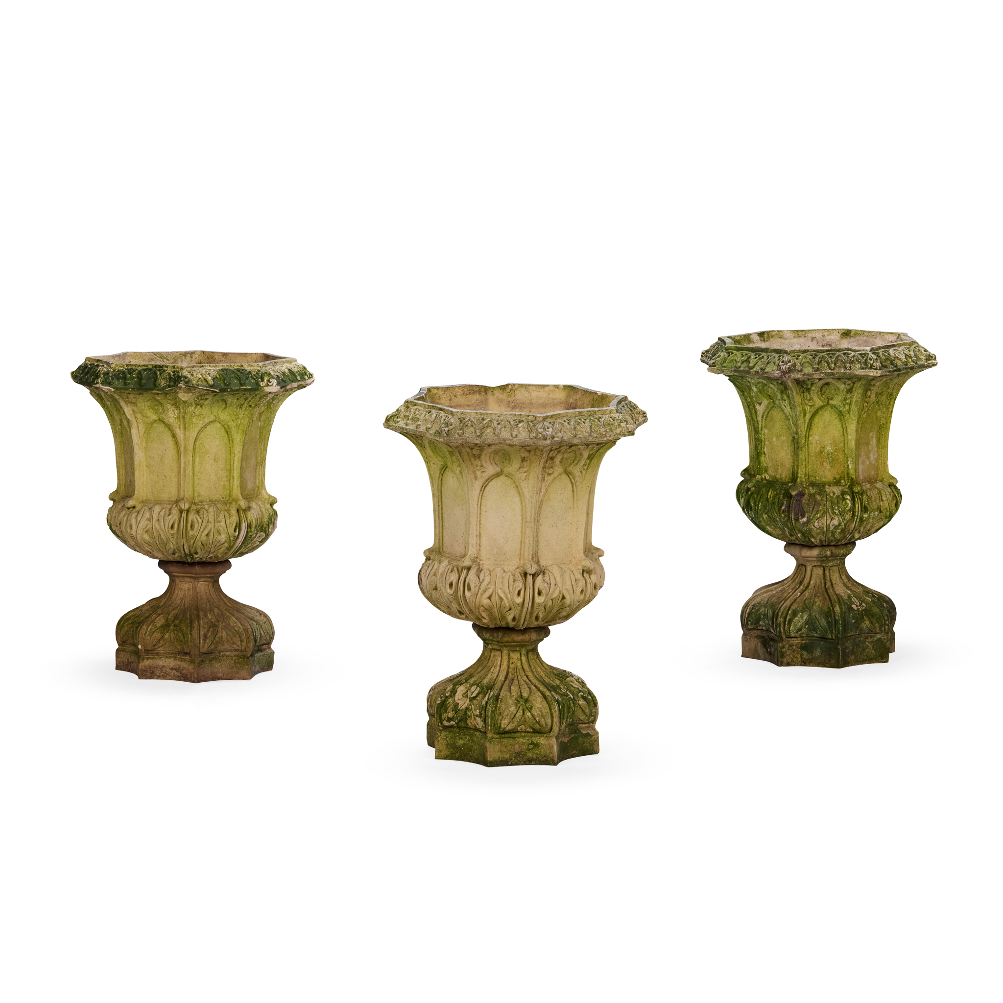 SET OF THREE CAST STONE GOTHIC STYLE GARDEN URNS