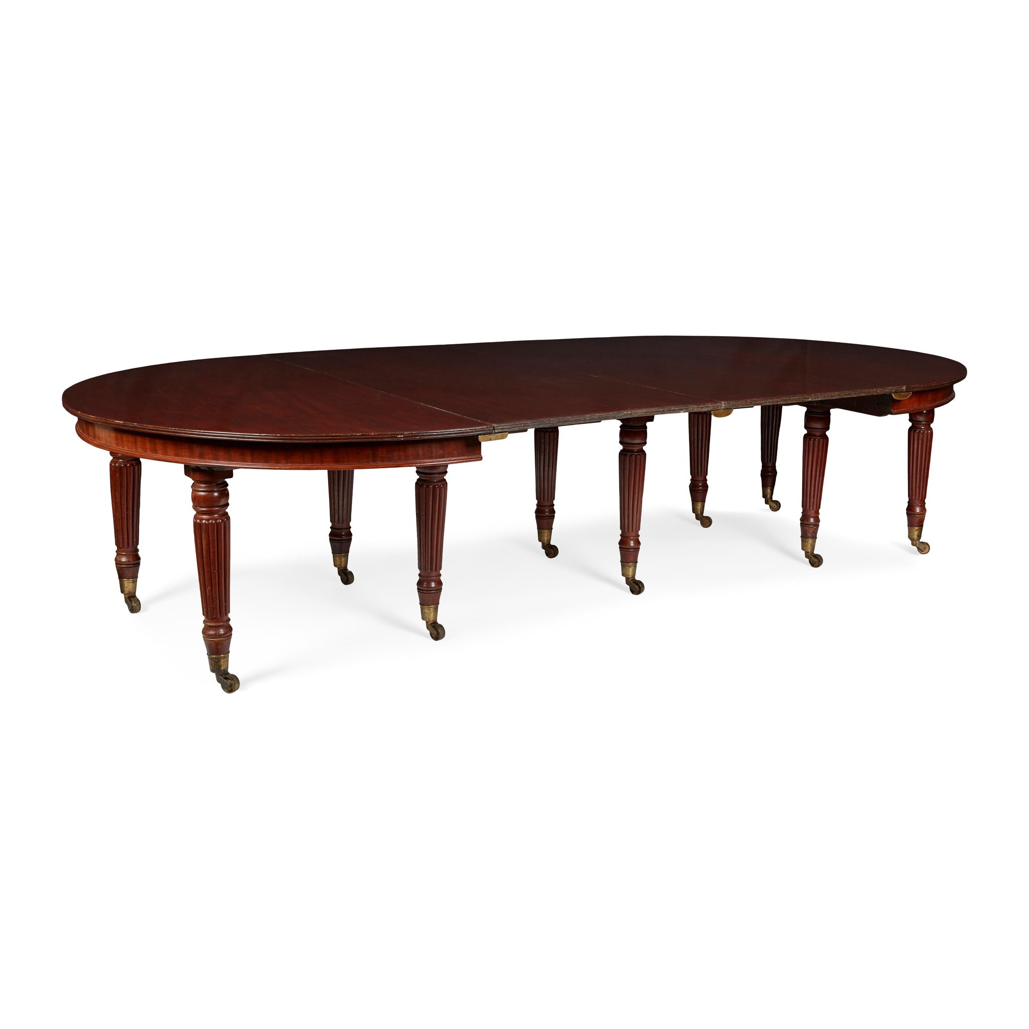 REGENCY STYLE MAHOGANY EXTENDING DINING TABLE, ATTRIBUTED TO WARING & GILLOW