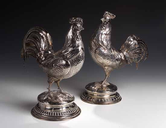 A pair of French silver models of cockerels