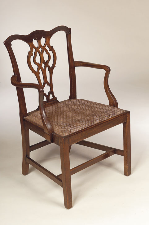 A George III mahogany open armchair