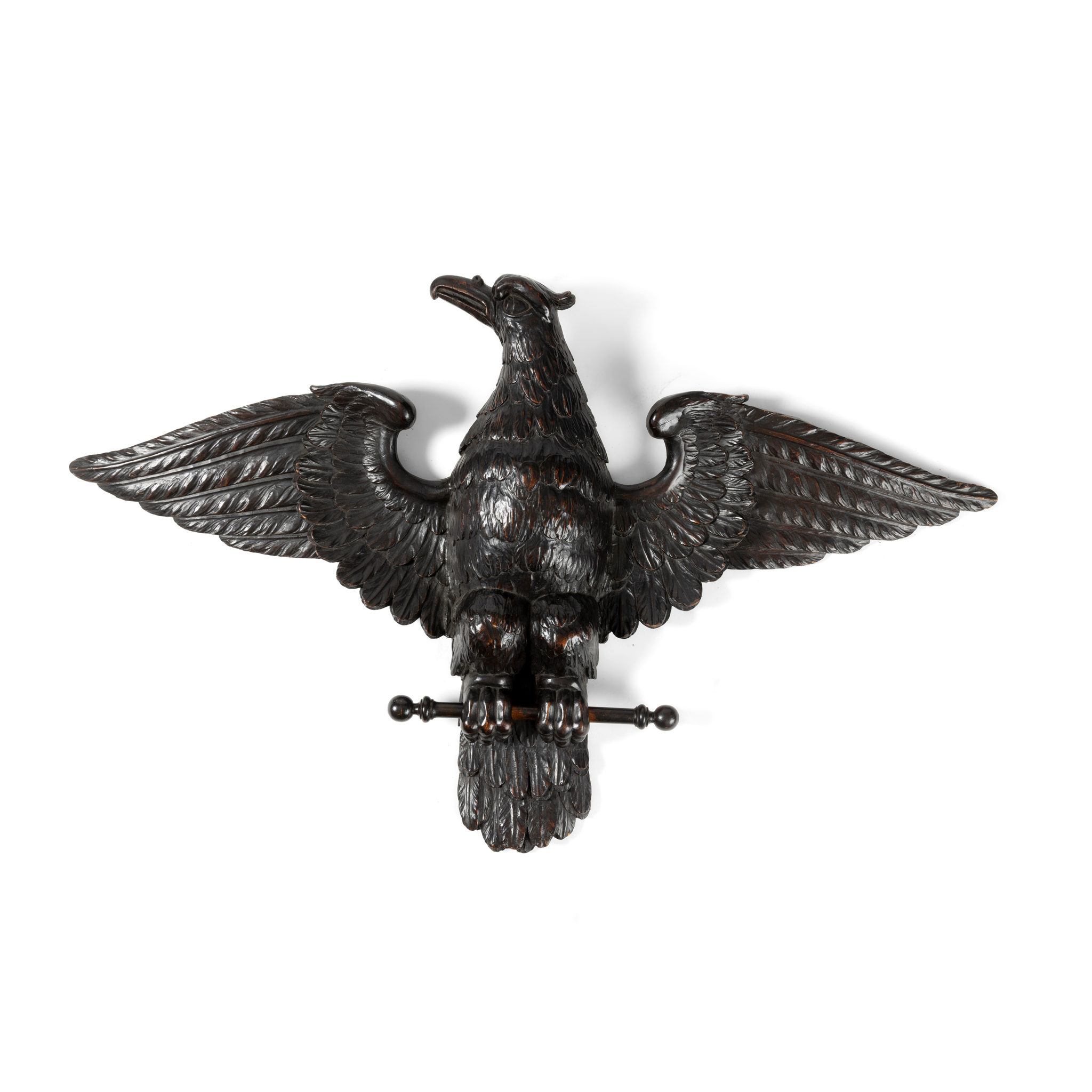 A CONTINENTAL CARVED BEECH WOOD EAGLE