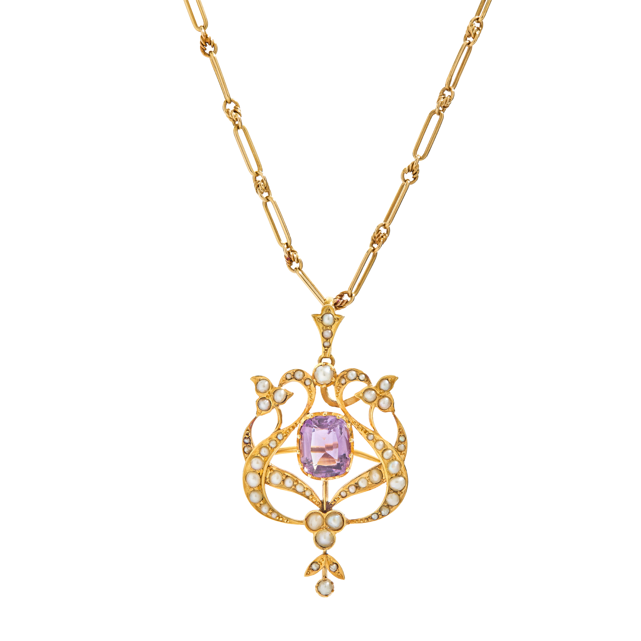 An early 20th century amethyst and seed pearl brooch pendant