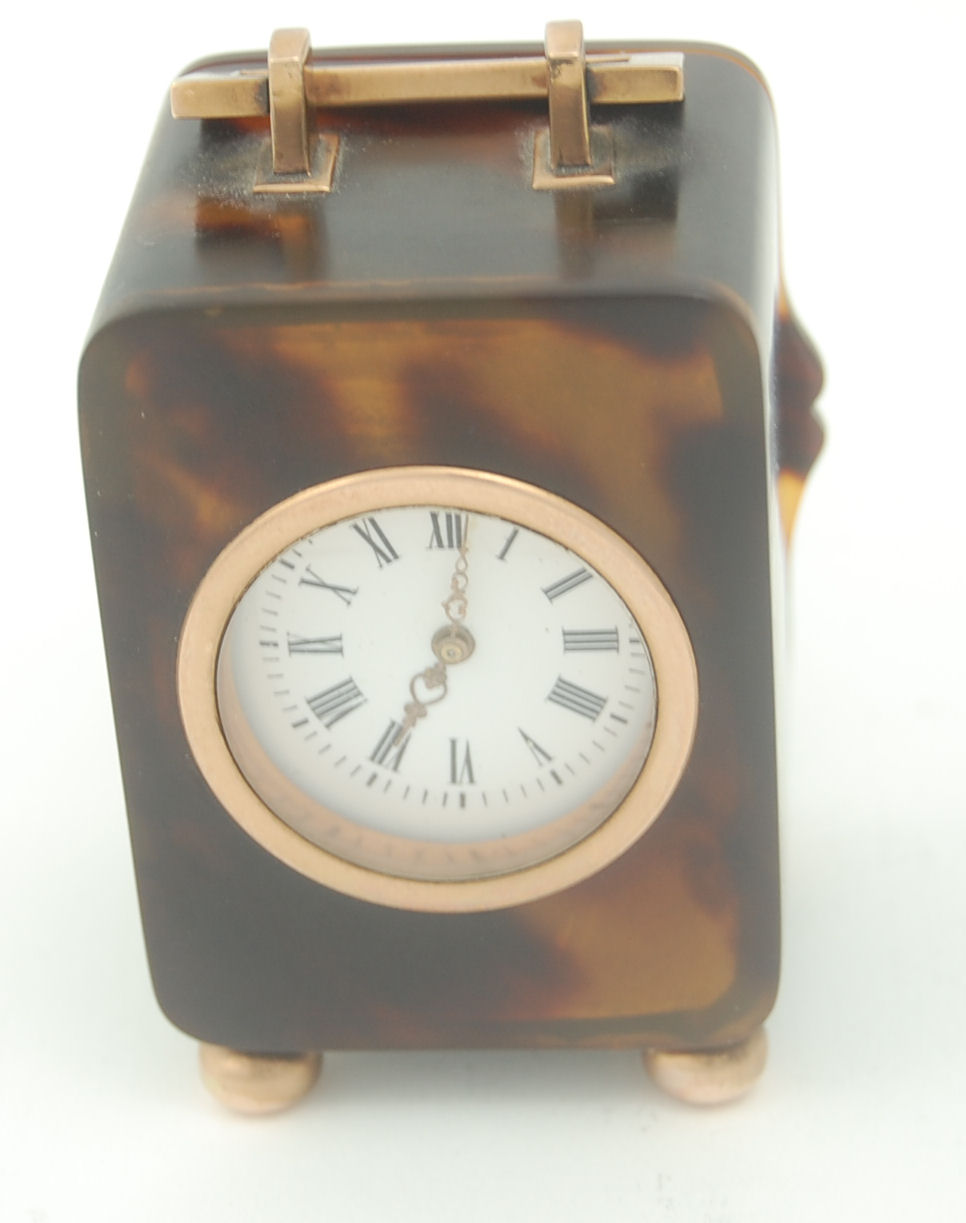 A tortoiseshell cased timepiece