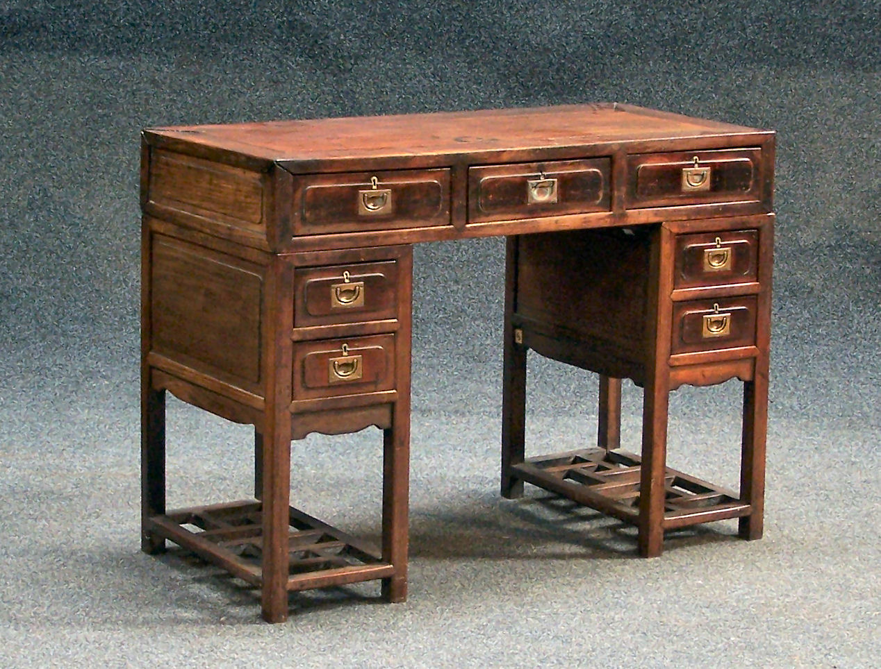 A 20th century Chinese hardwood desk,