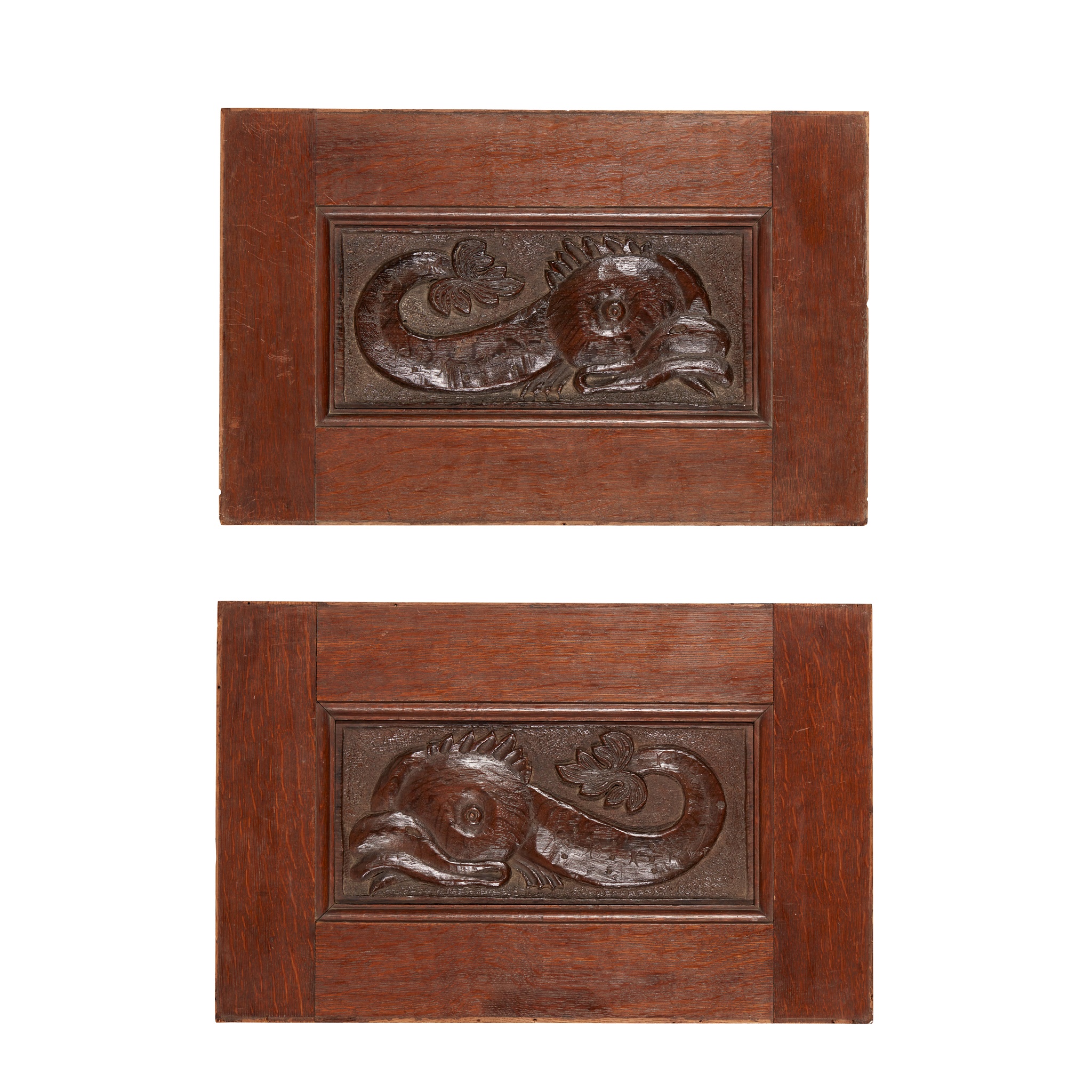 PAIR OF CARVED OAK PANELS OF DOLPHINS