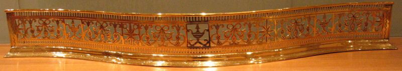 A late 18th century brass fender