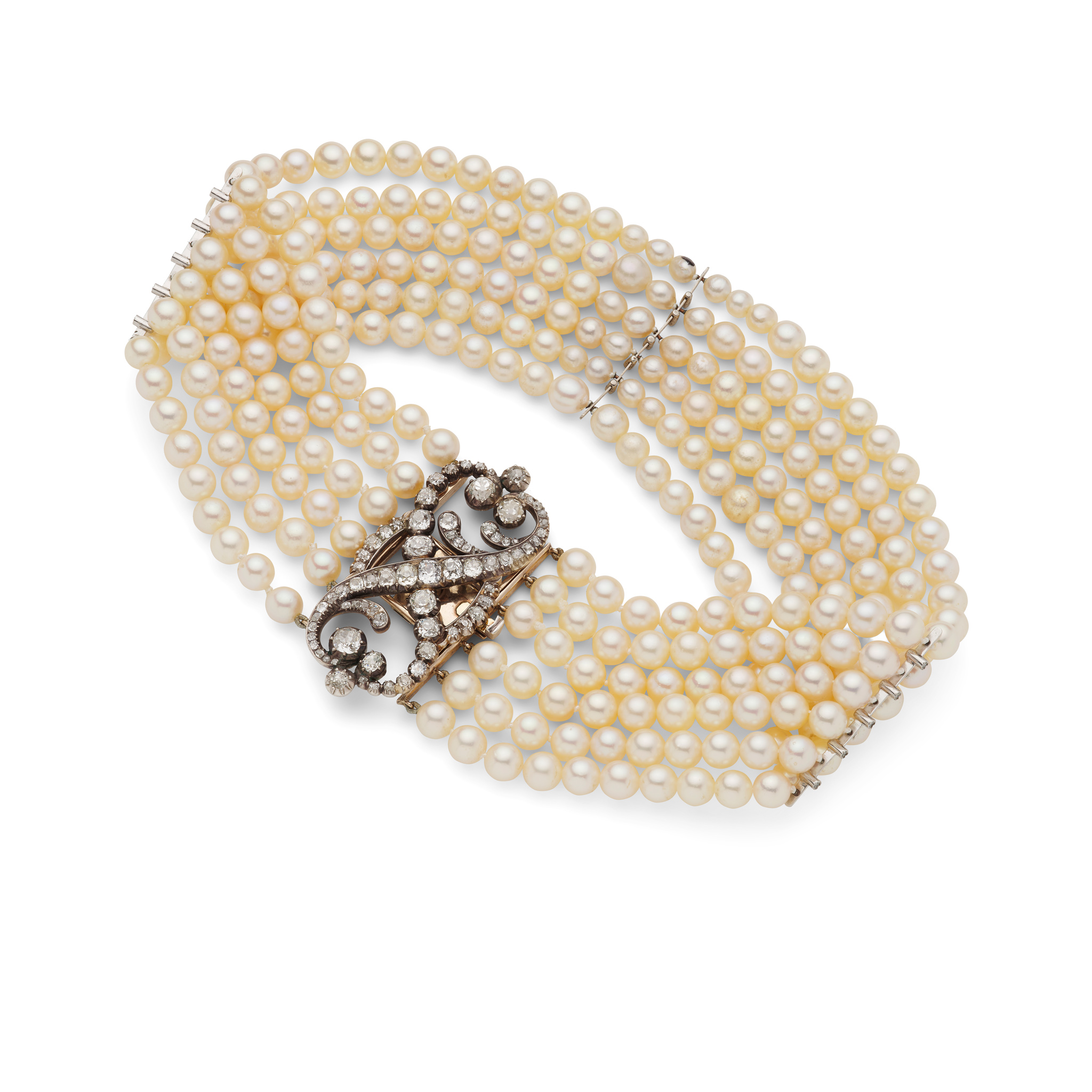 A multi-strand pearl choker, with a mid 19th century diamond clasp / brooch