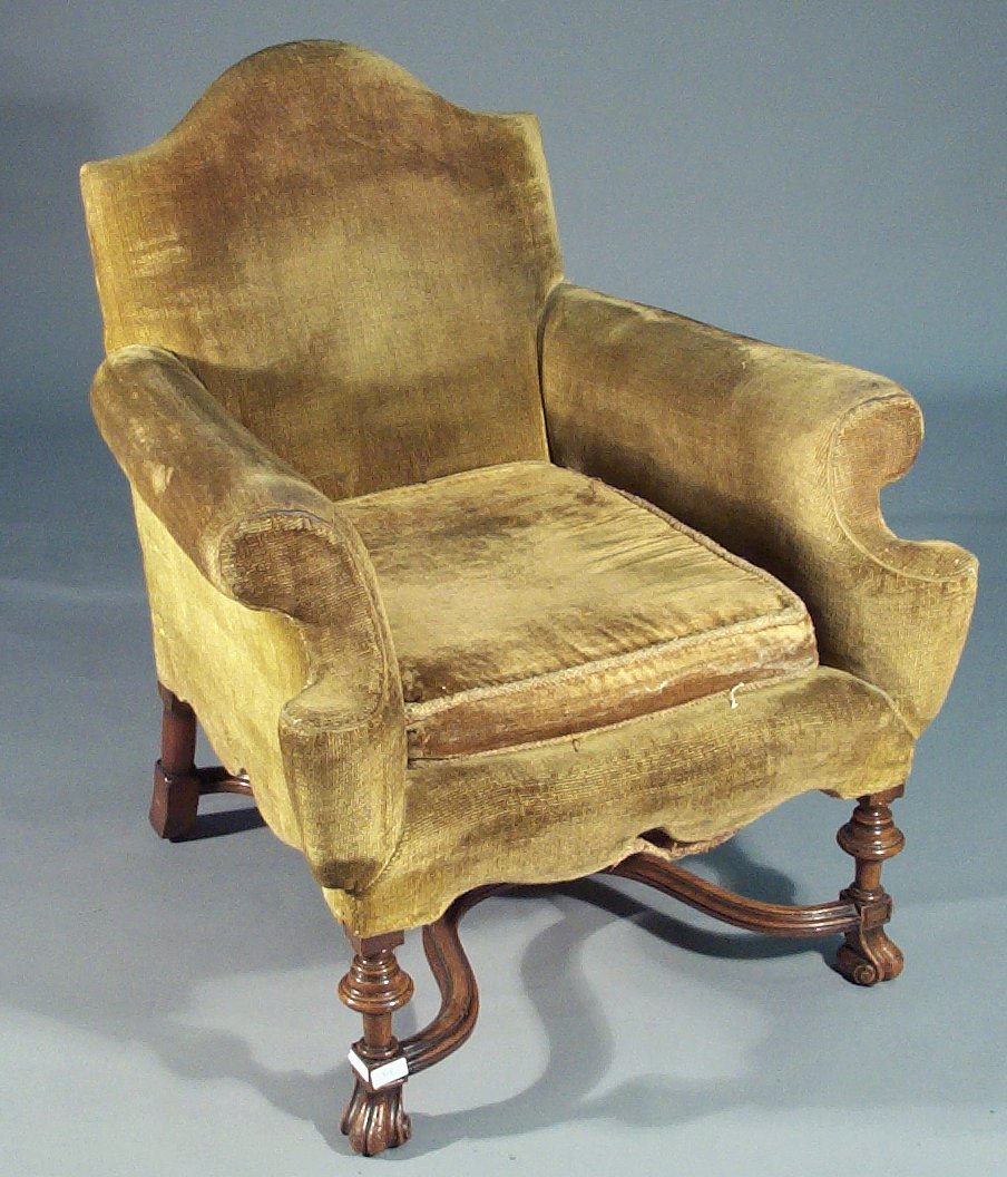 A William and Mary style walnut framed and upholstered armchair