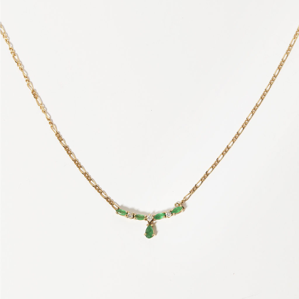 An emerald and diamond set necklace