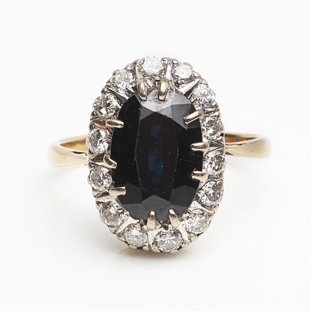 A sapphire and diamond set cluster ring