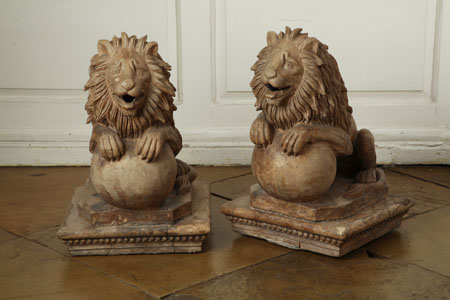 A pair of sandstone crouching lions