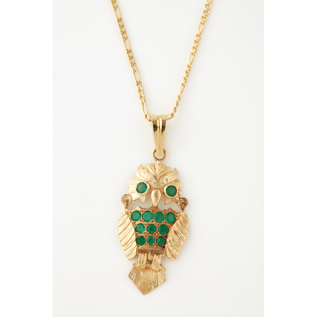 A emerald set owl pendant