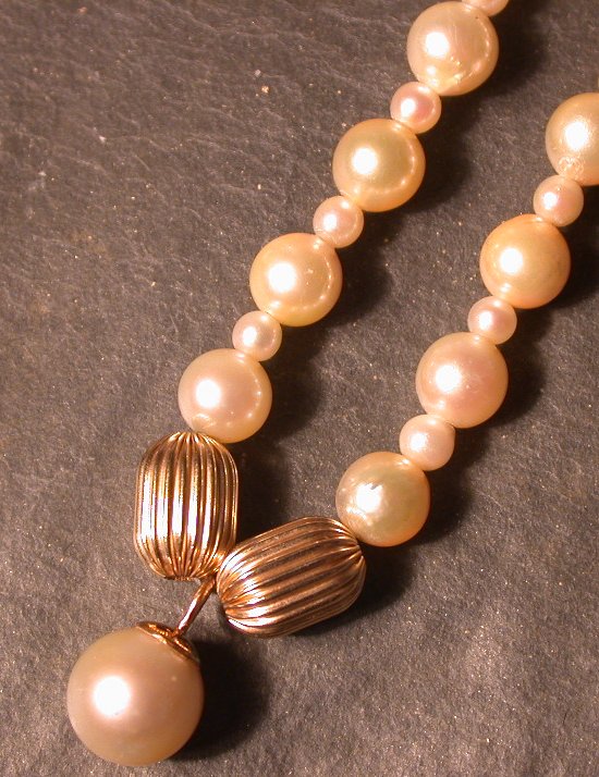 A late 19th century Bohemian gilt and ruby glass ewer and two goblets en suite