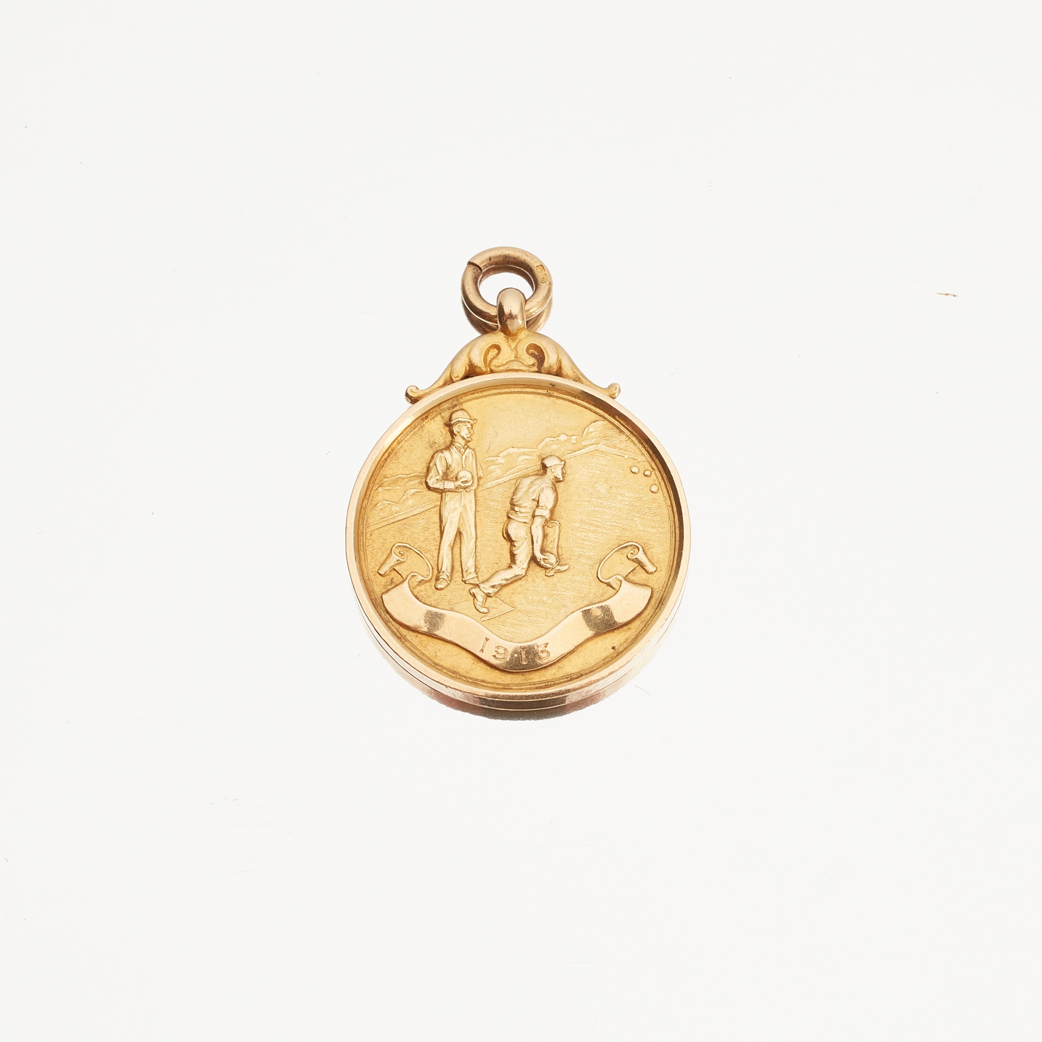 An 18ct gold Bowling Medal