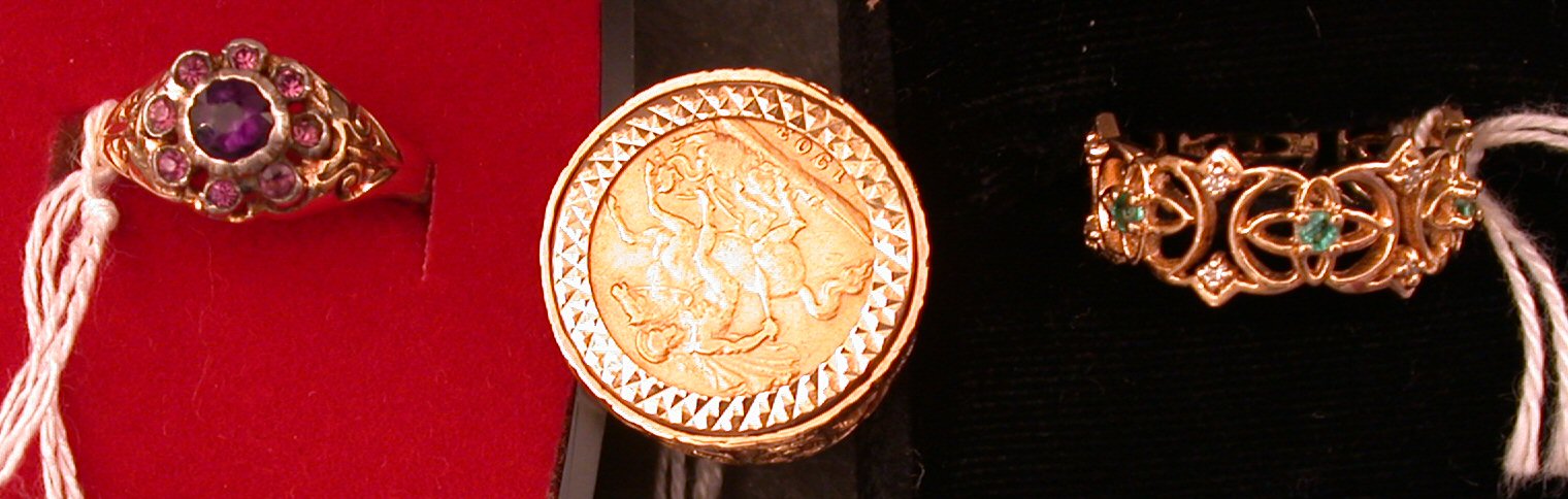 A lot comprising an eternity ring in open worked 14ct yellow gold, embellished with emeralds and diamonds,