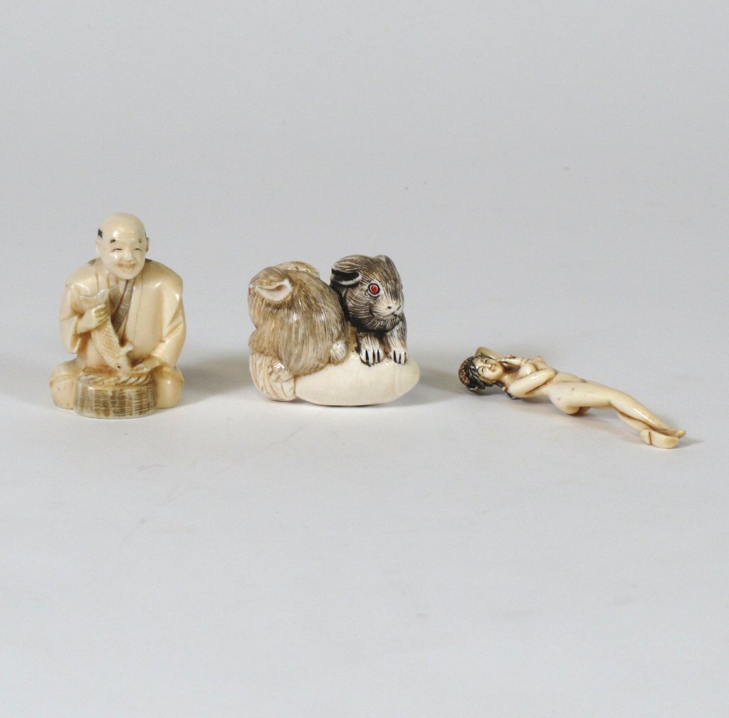 GROUP OF THREE JAPANESE IVORY NETSUKES
