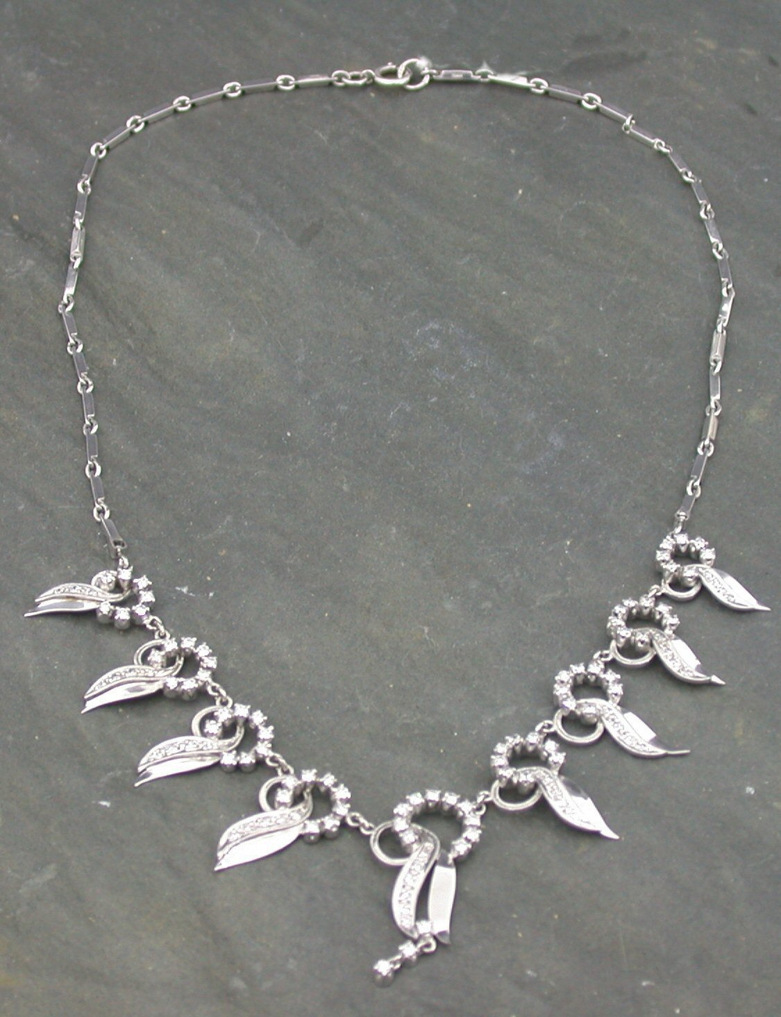 An 18ct white gold diamond necklace,