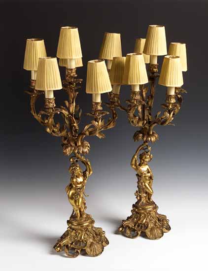A pair of gilt bronze six light candelabra
