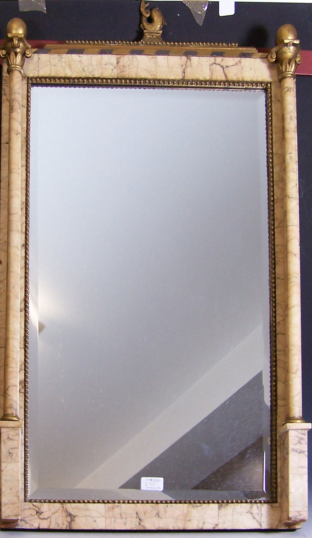 A alabaster and gilt pier glass,