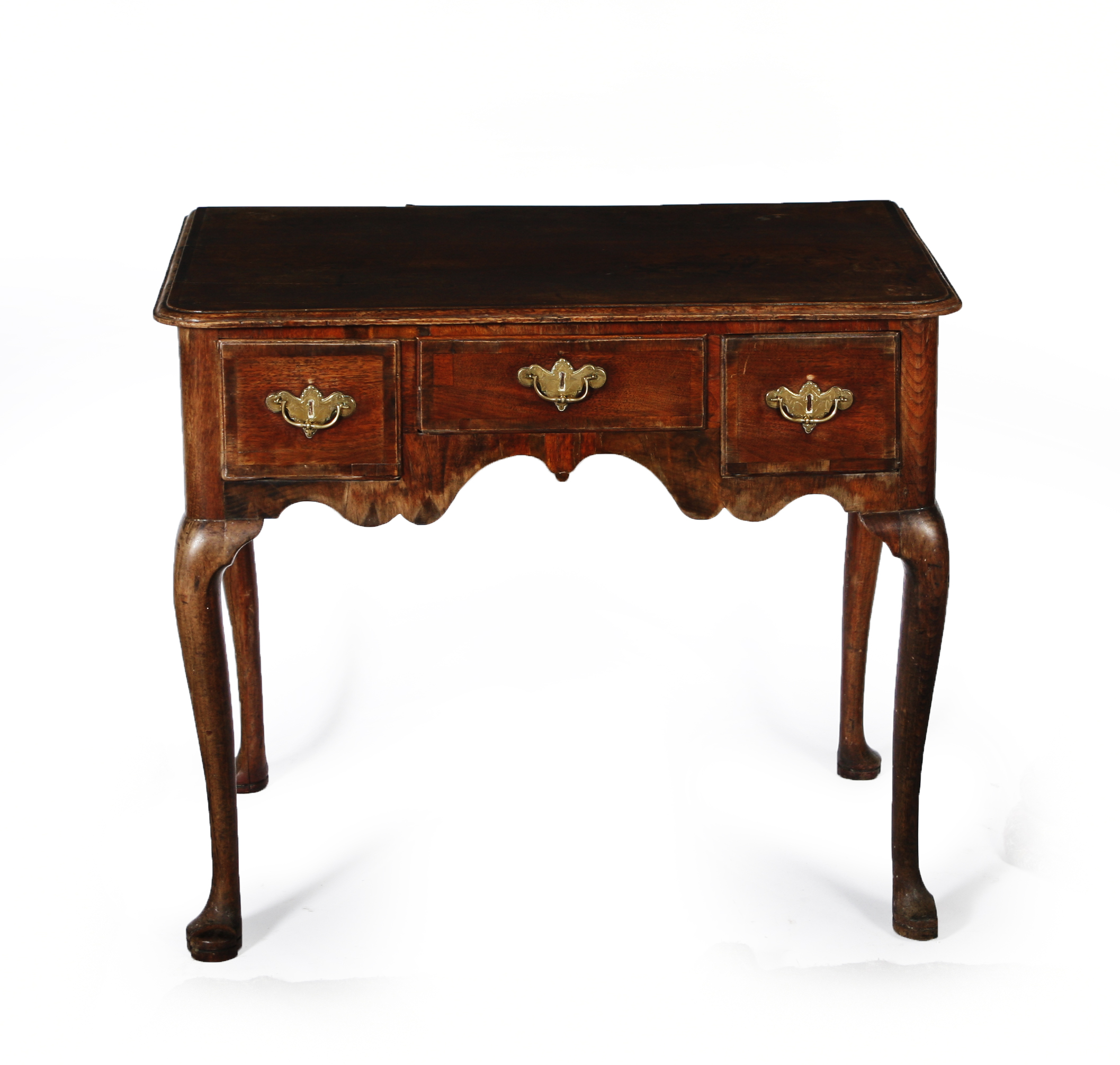 GEORGIAN WALNUT AND MAHOGANY LOWBOY