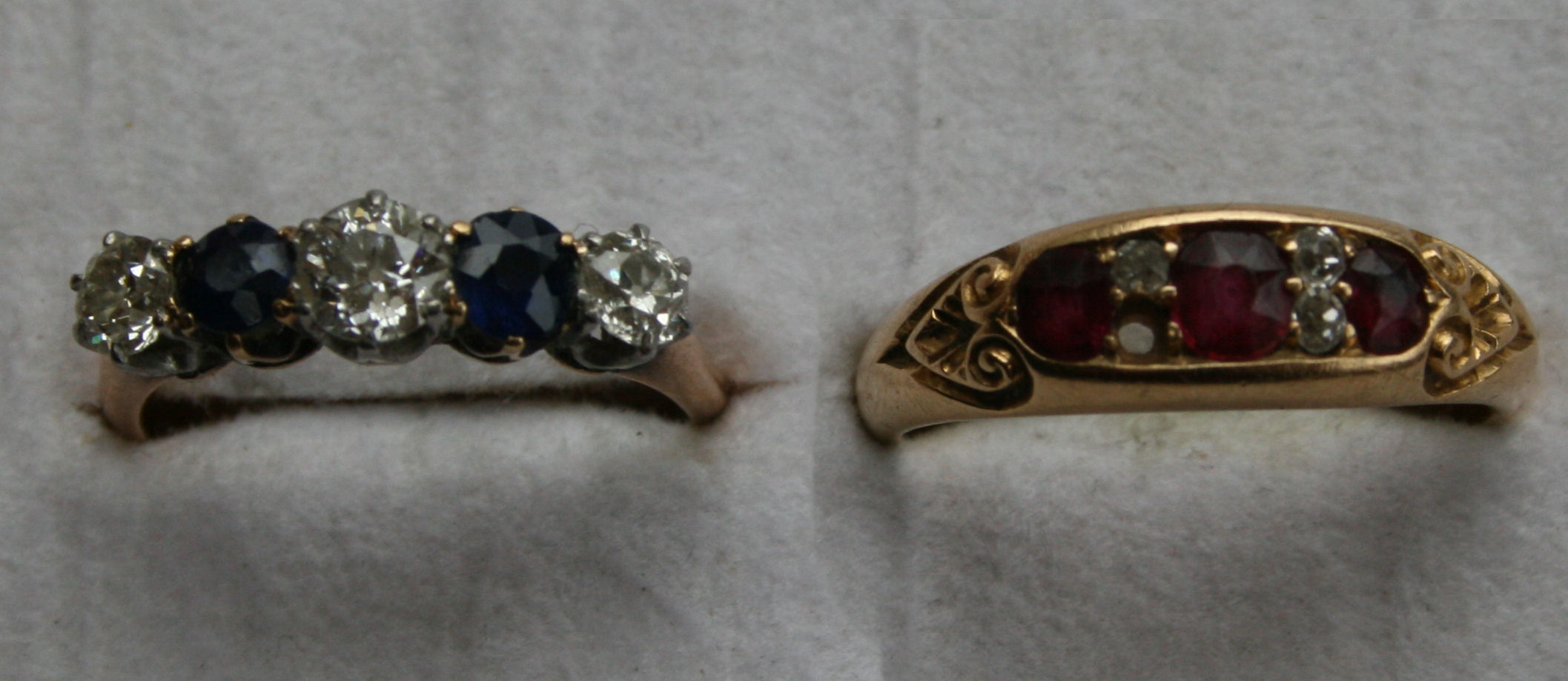 A traditional five stone diamond and sapphire ring