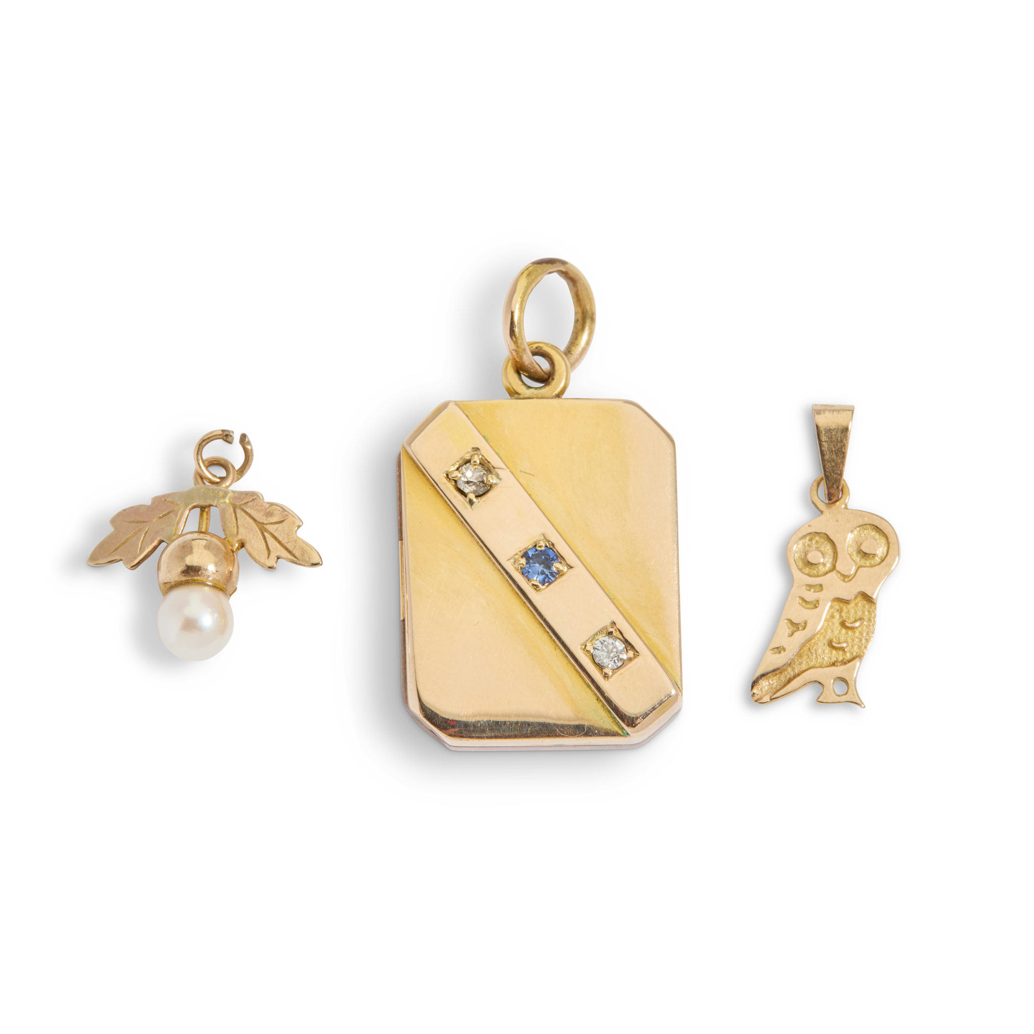 Three gem-set pendants