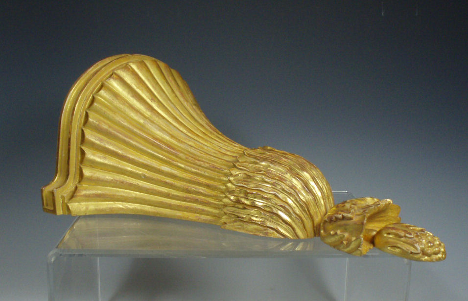 A pair of giltwood Adam style wall brackets