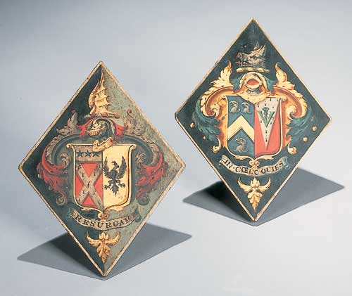 A matched pair of Georgian hatchments