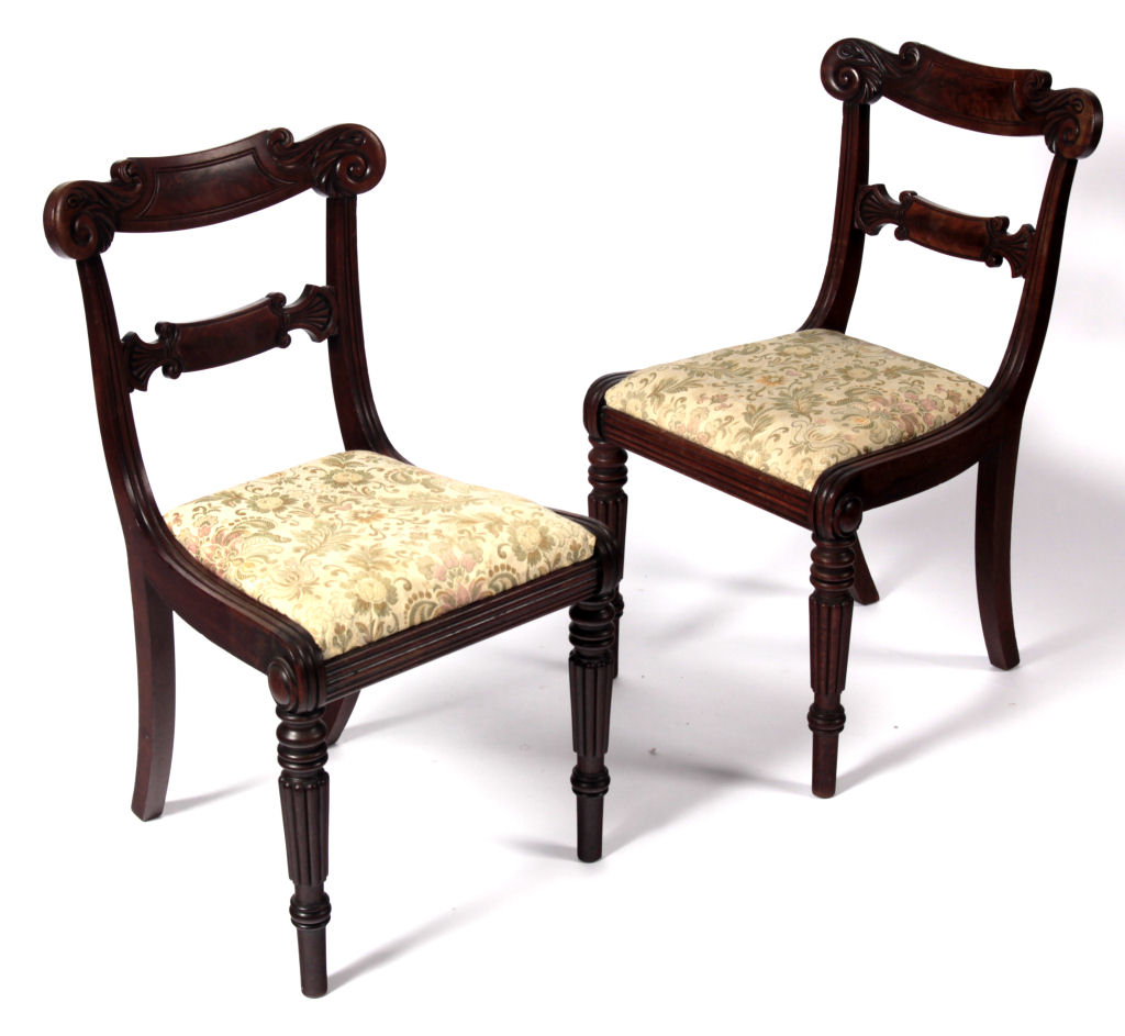 A set of four Regency dining chairs