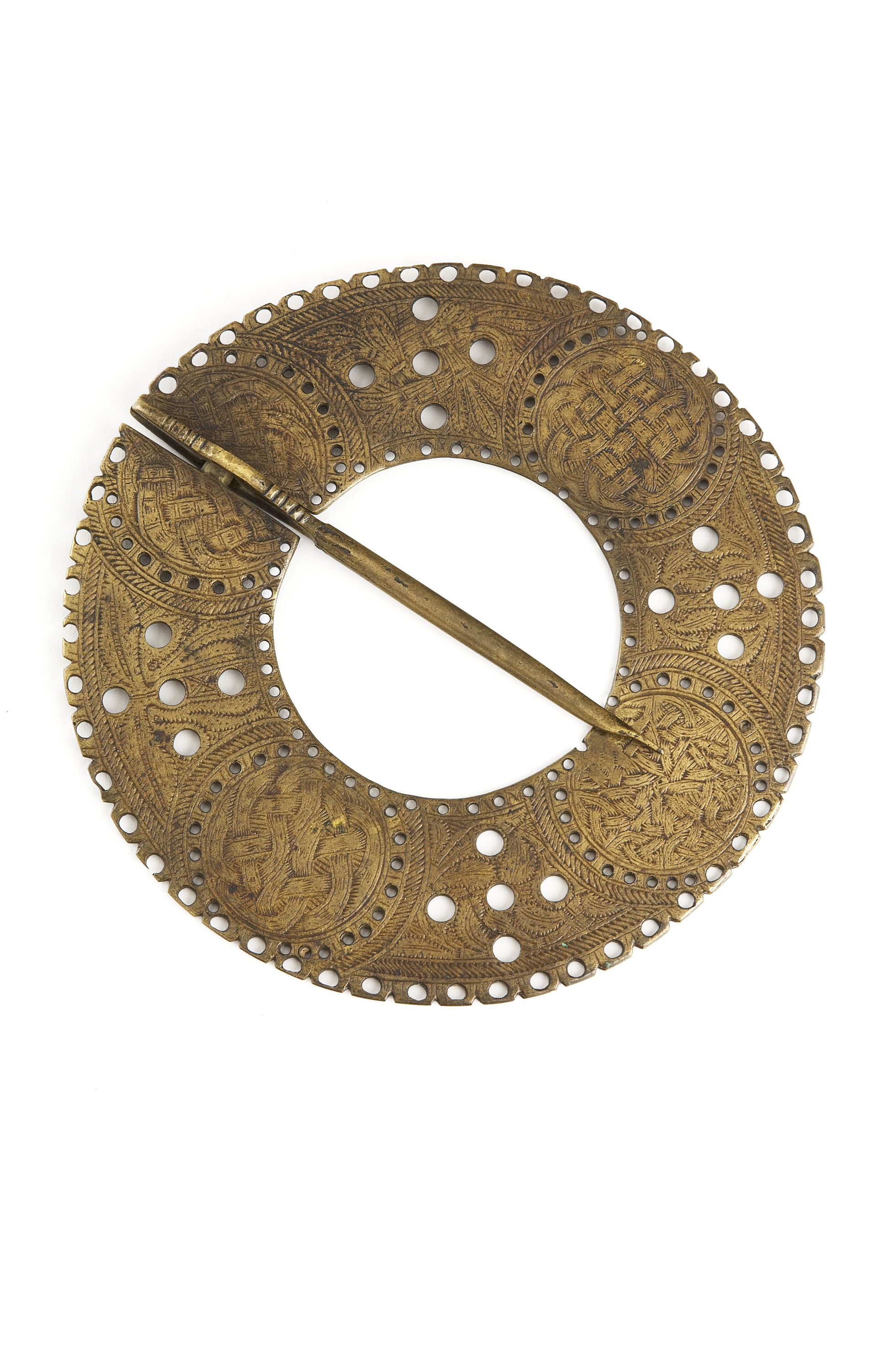 A large early Scottish annular brass brooch