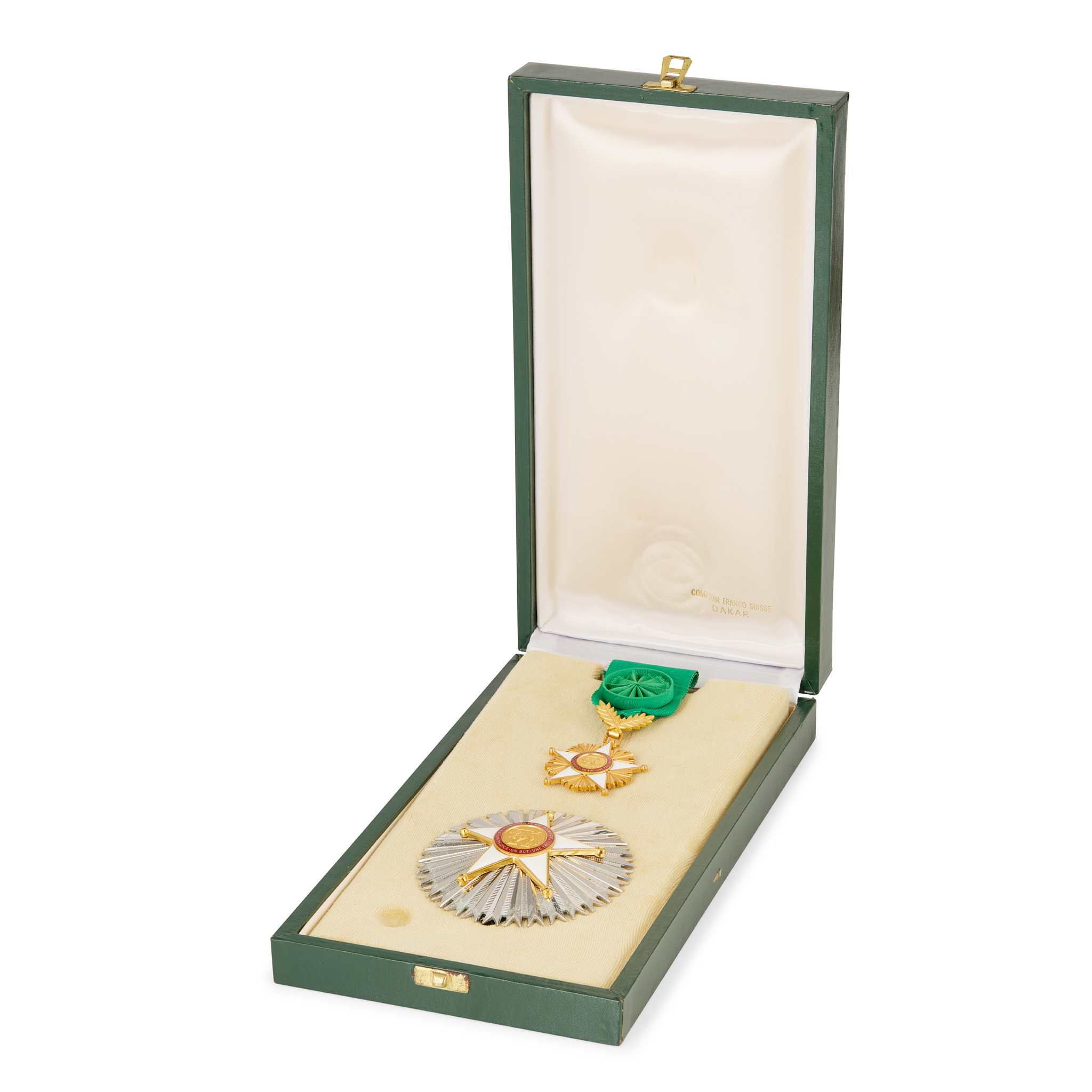 SENEGAL – A CASED WHITE METAL BREAST BADGE WITH AN ENAMEL SET MEDAL