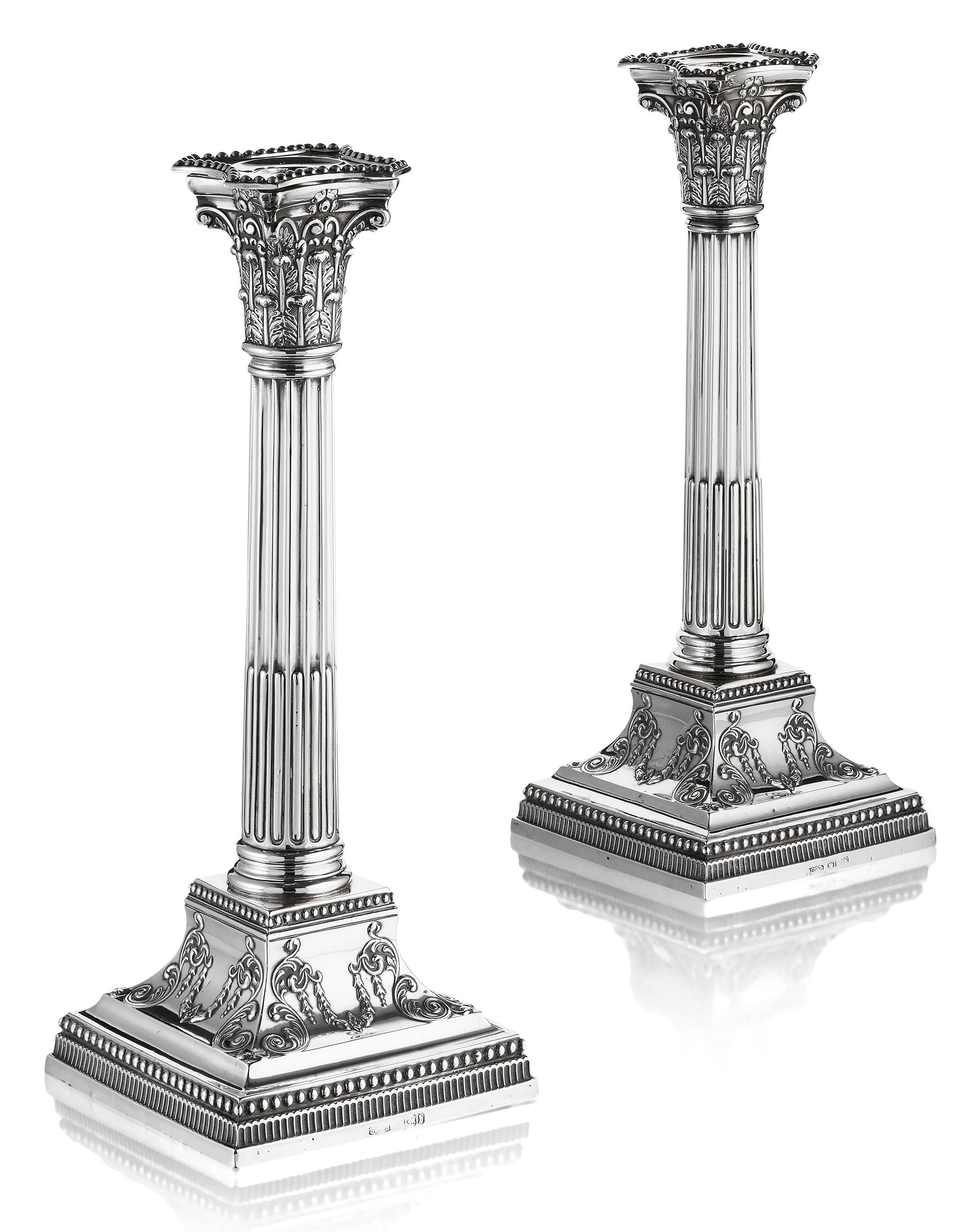 A pair of silver candlesticks