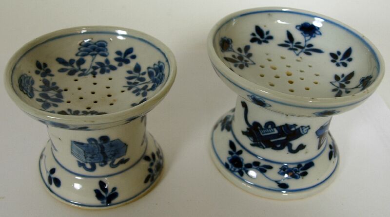 Two similar Chinese blue painted porcelain pounce pots Kangxi period