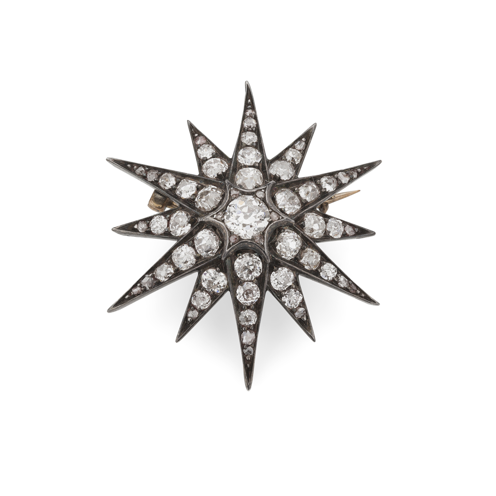 A Victorian diamond set star brooch/pendant