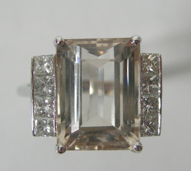 A pale pink topaz and diamond set cocktail ring,