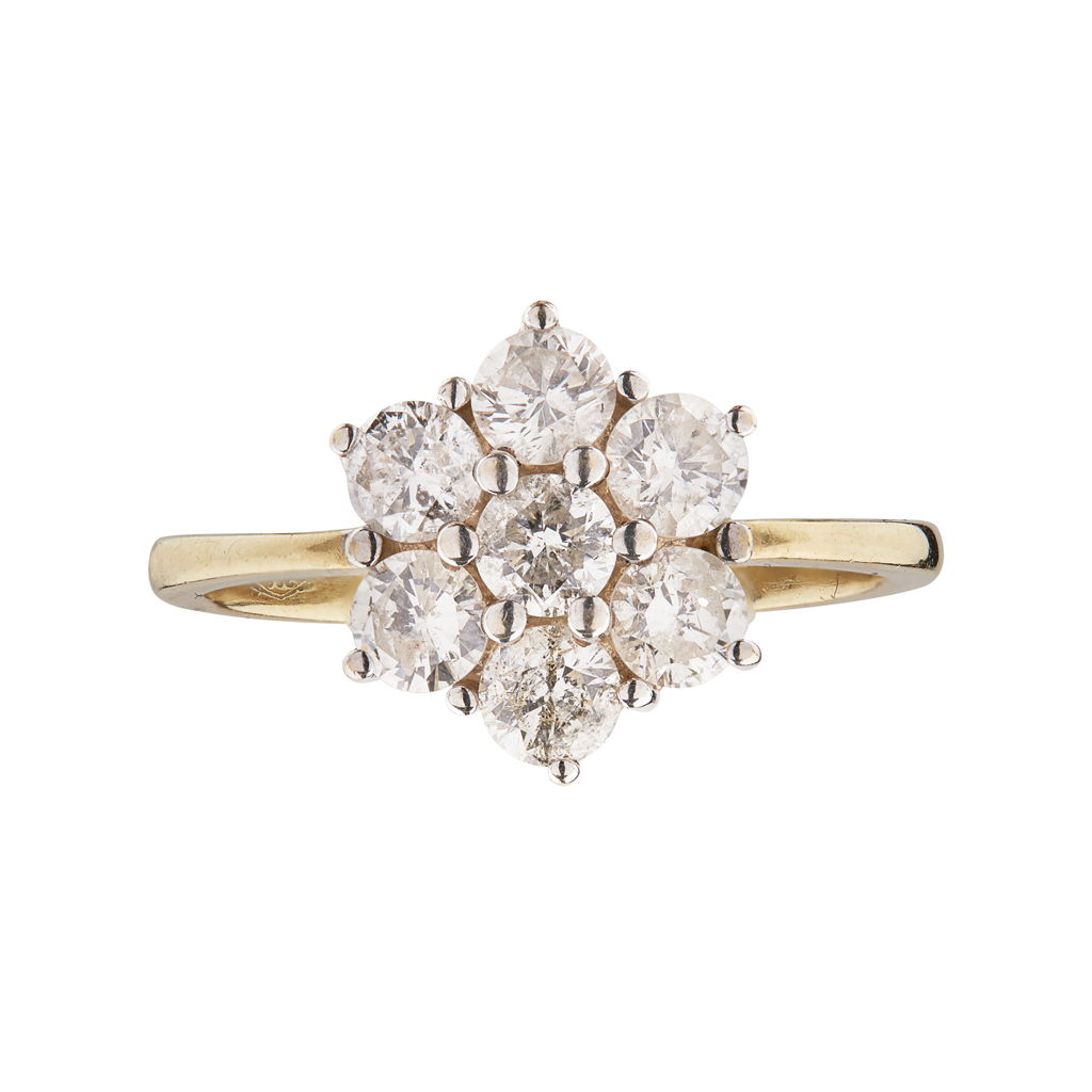 A diamond set cluster ring