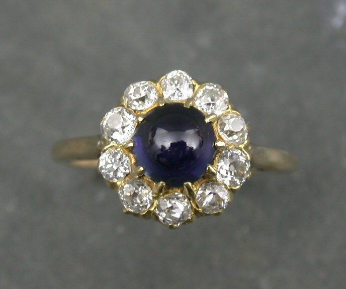 A sapphire and diamond cluster ring,