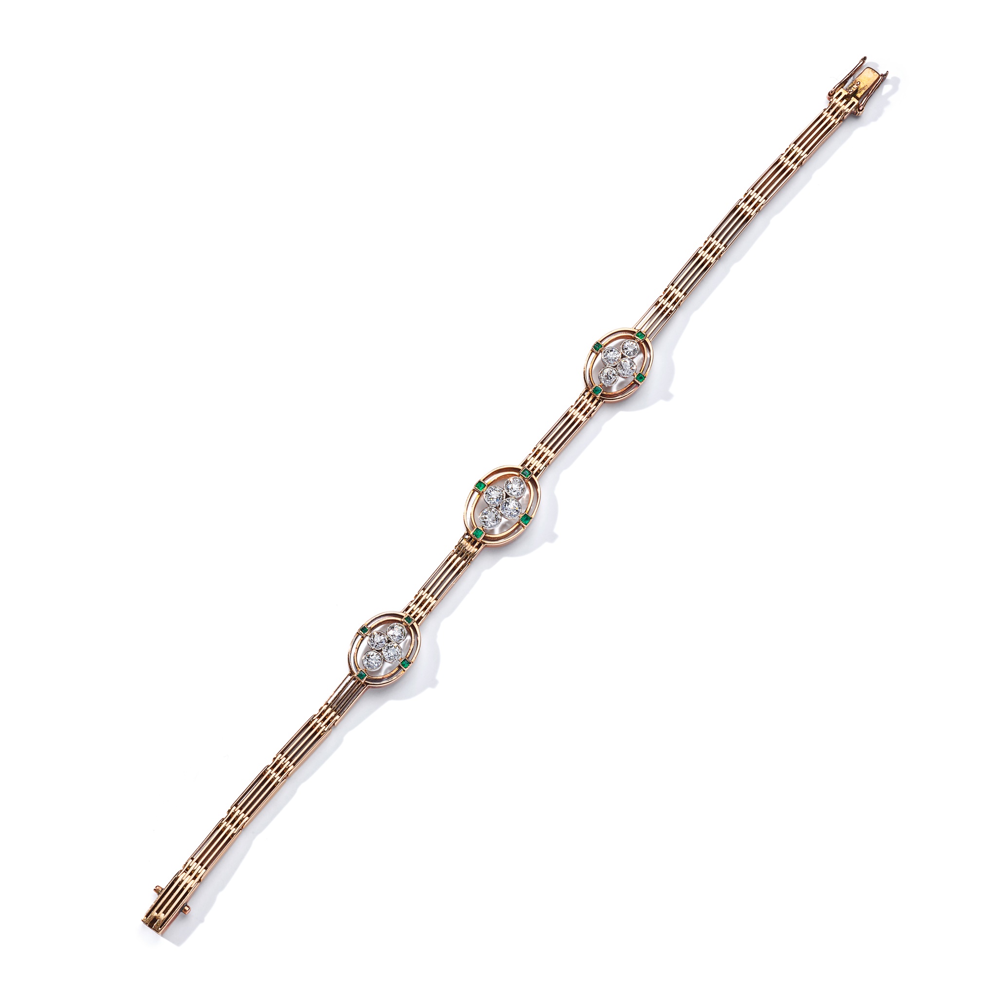A diamond and emerald-set bracelet, circa 1900
