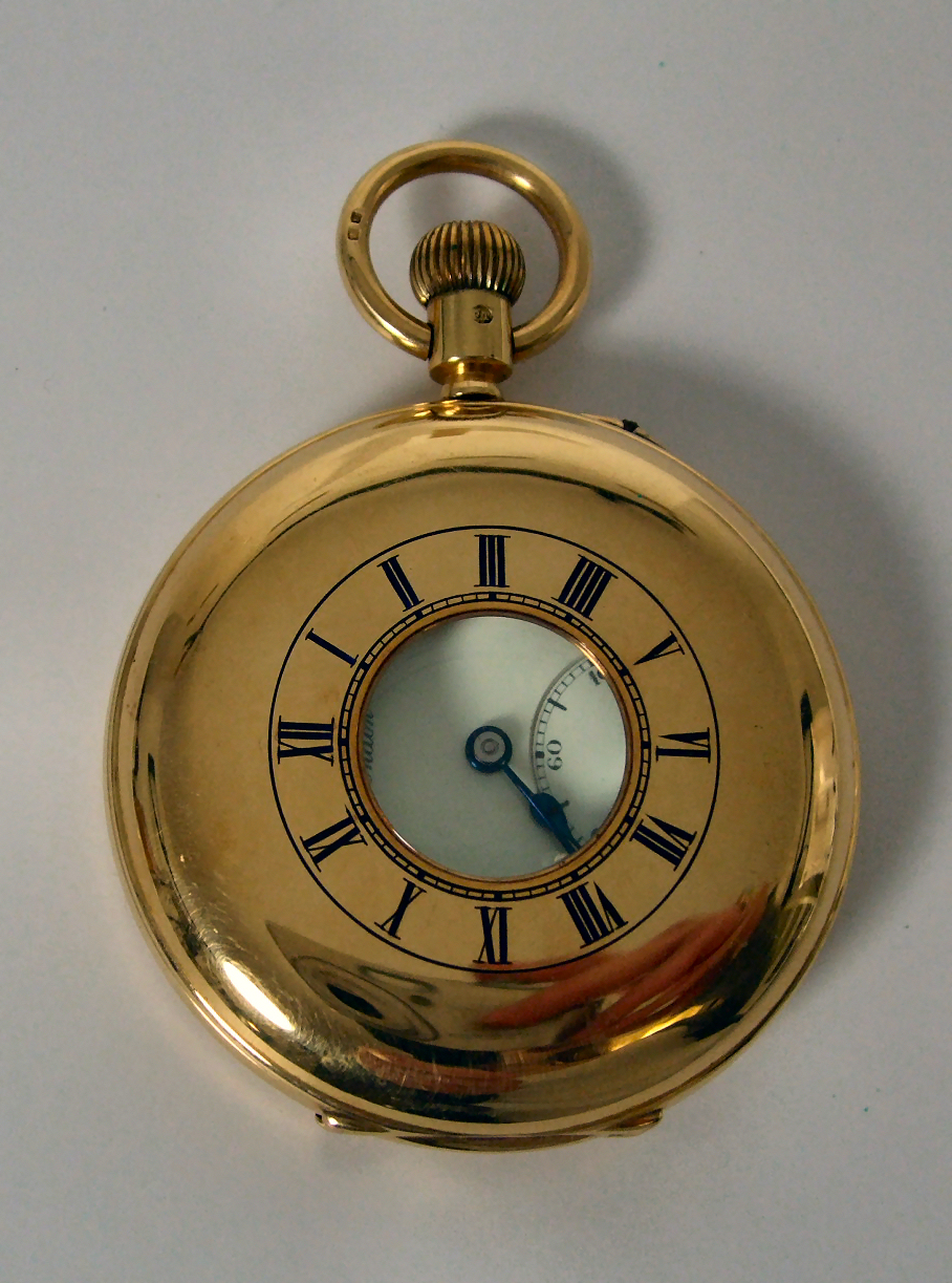 An 18ct gold half Hunter pocket watch