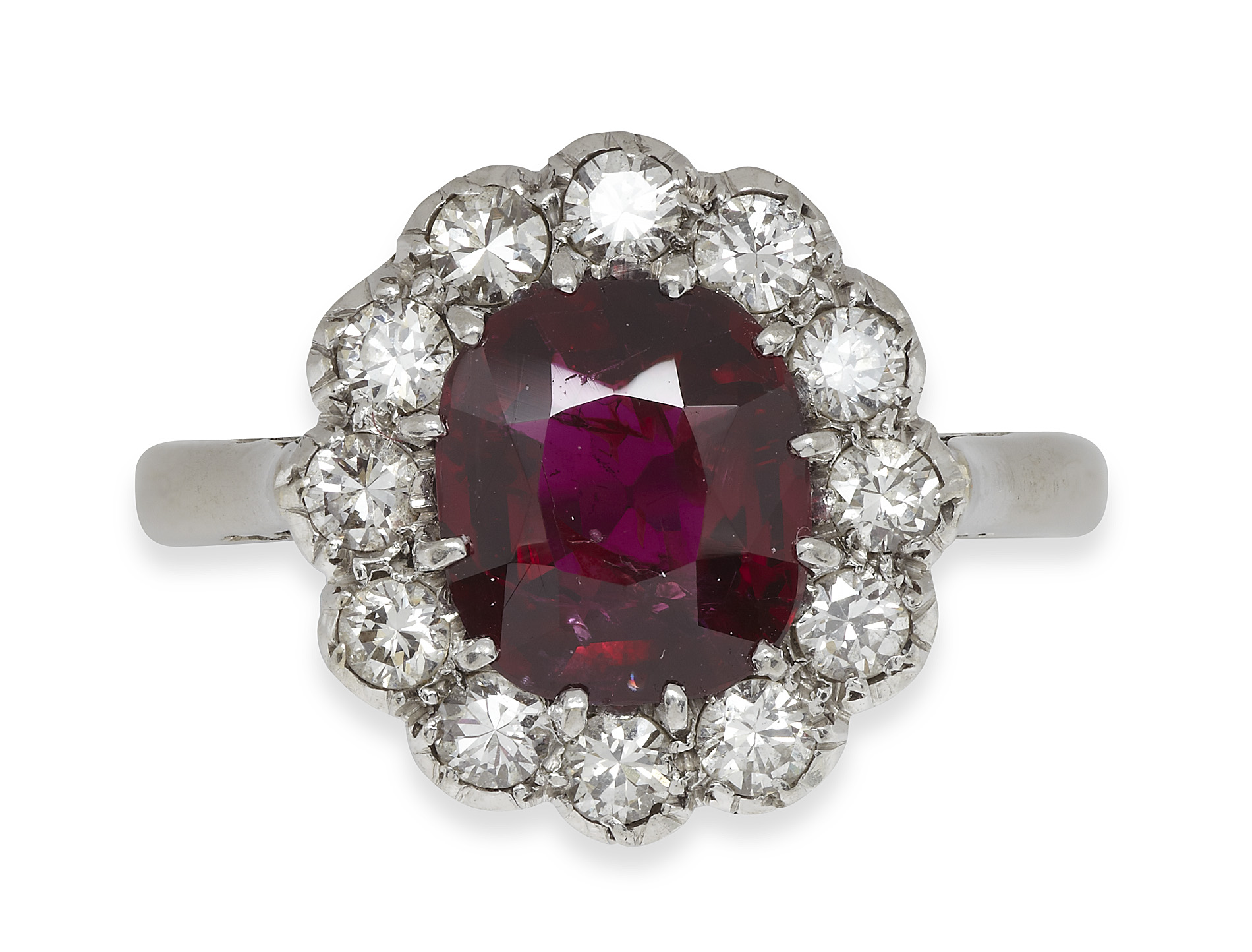A ruby and diamond set cluster ring
