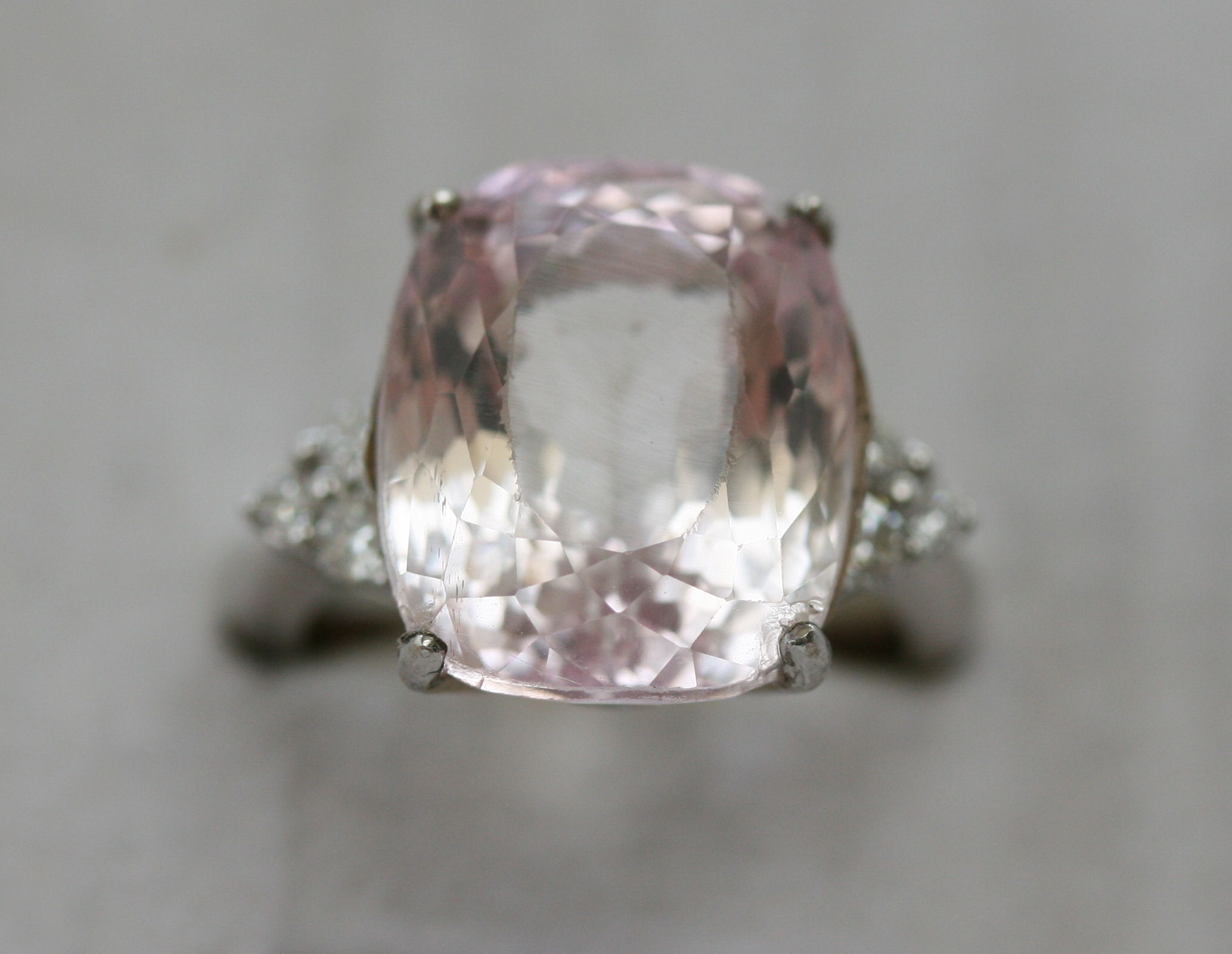A Kunzite and diamond dress ring