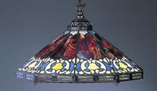 A Tiffany style stained and leaded glass light shade