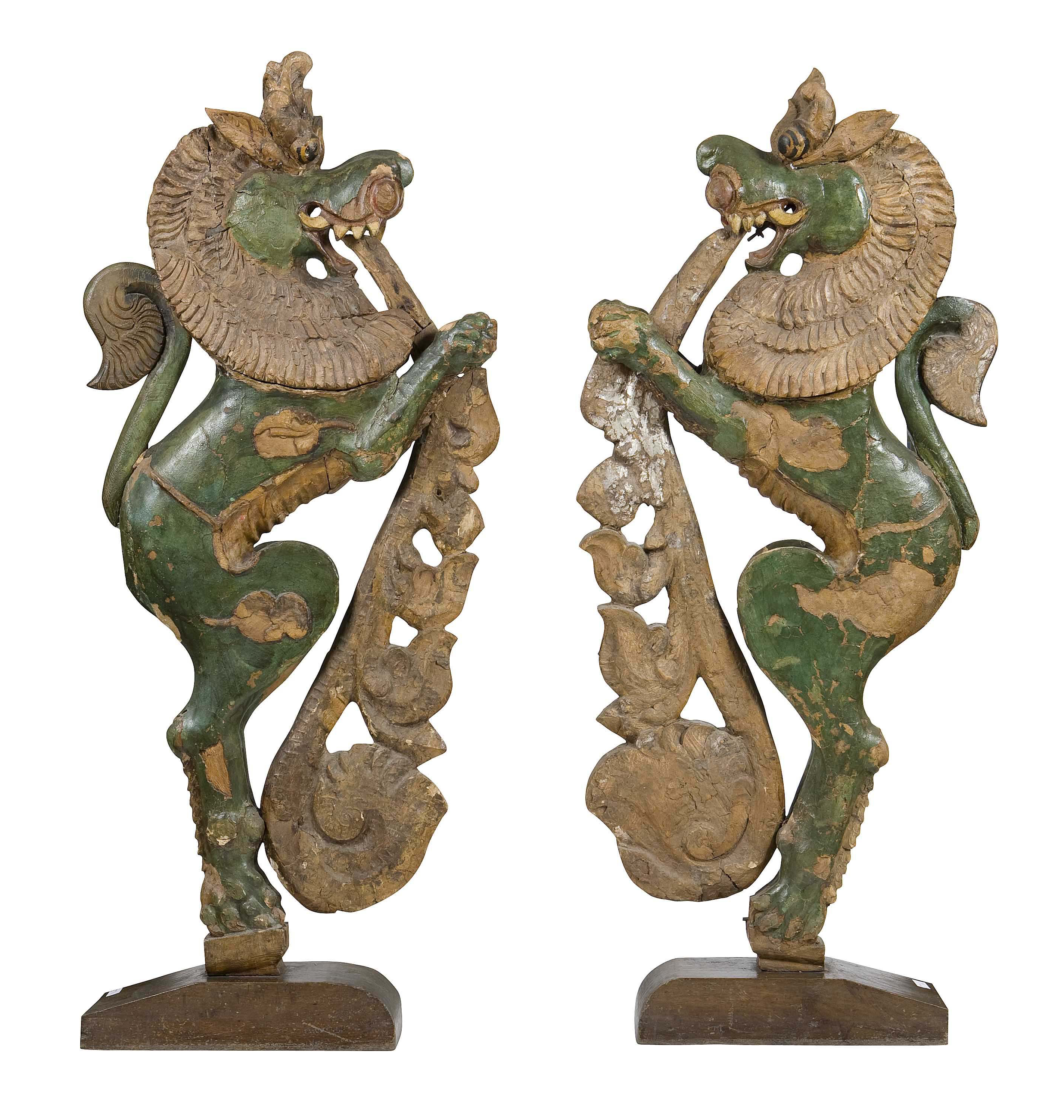 PAIR OF TIBETAN PAINTED CARVED WOODEN TEMPLE GUARDIANS