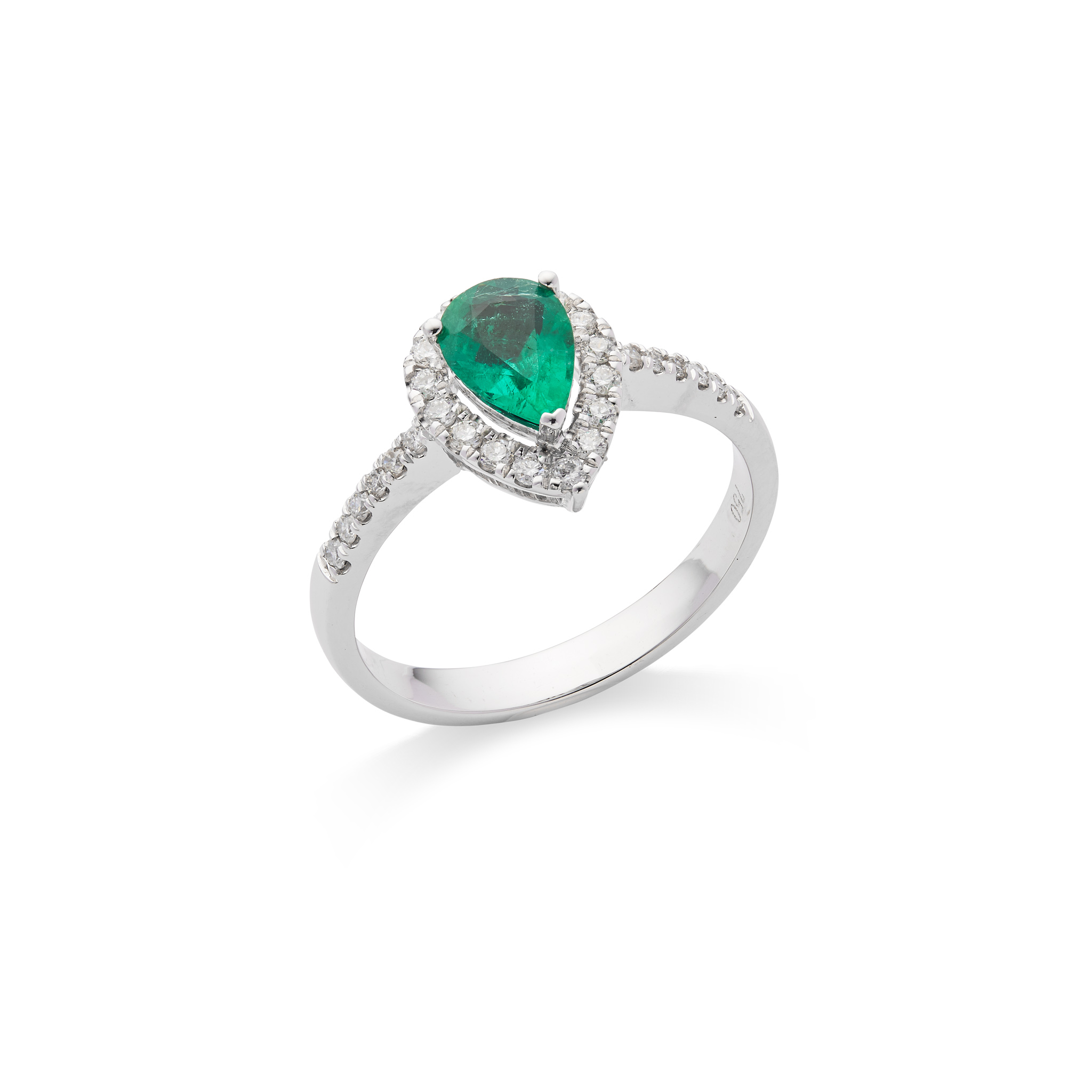 An emerald and diamond cluster ring